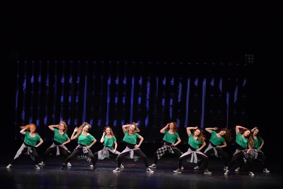 Moonstar company team performing on stage